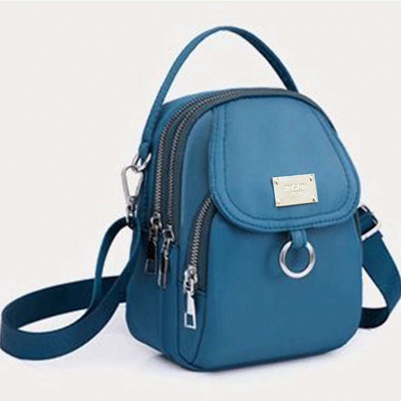 Neutral style backpack for men and women, suitable for travel and photography, multi-layered pocket, cross-body bag