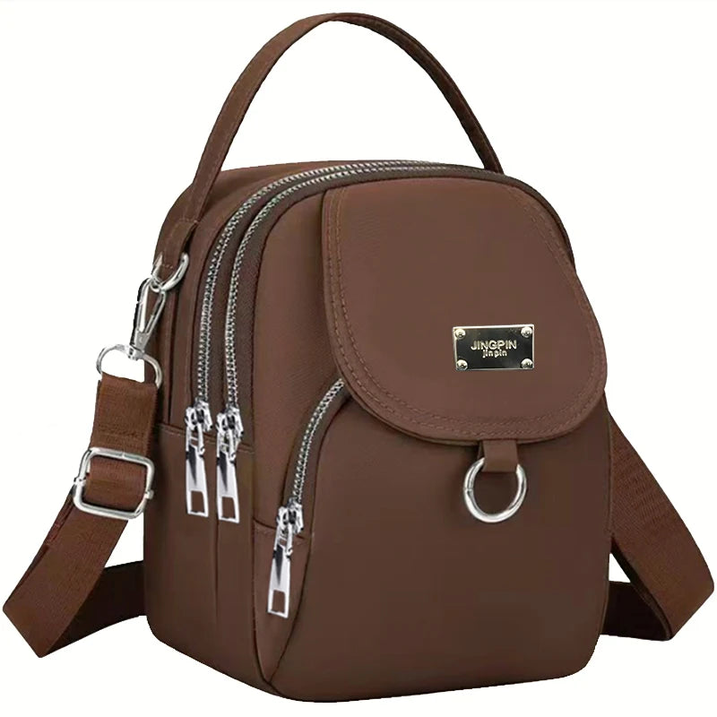 Neutral style backpack for men and women, suitable for travel and photography, multi-layered pocket, cross-body bag