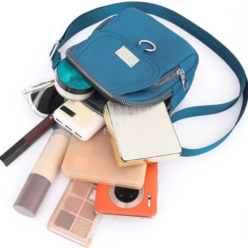 Neutral style backpack for men and women, suitable for travel and photography, multi-layered pocket, cross-body bag