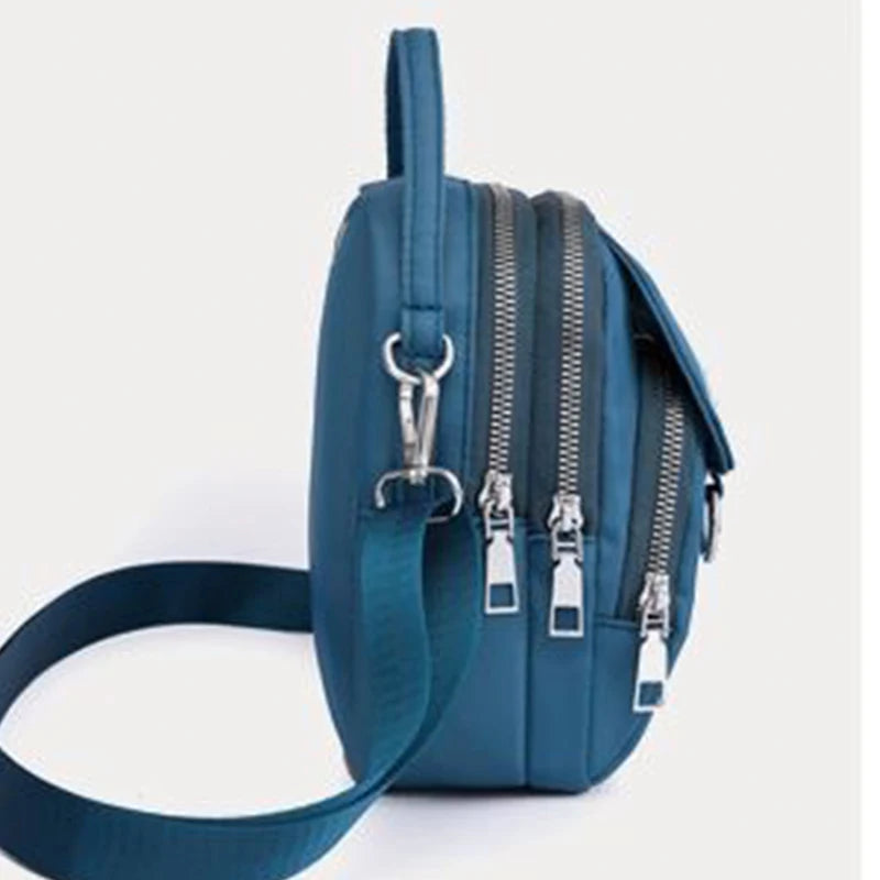 Neutral style backpack for men and women, suitable for travel and photography, multi-layered pocket, cross-body bag